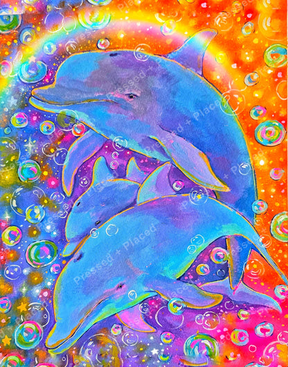 Three blue dolphins in a rainbow bubble-filled fantasy ocean scene